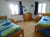 blaues Zimmer mit Variante Einzelbetten